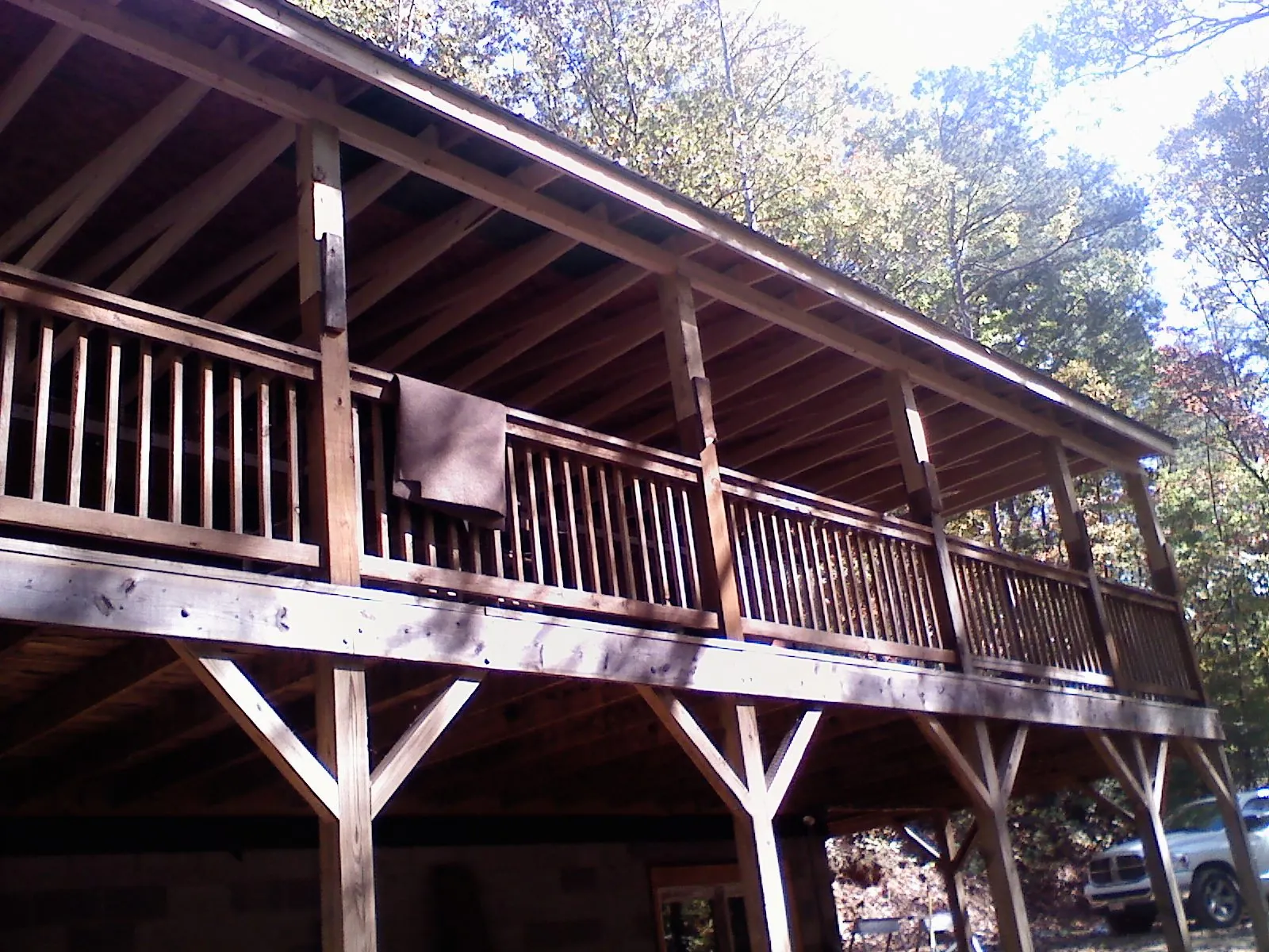 Timber framing under a new elevated porch and deck — Roof Leak Repair in Guilford by Roofing Brothers